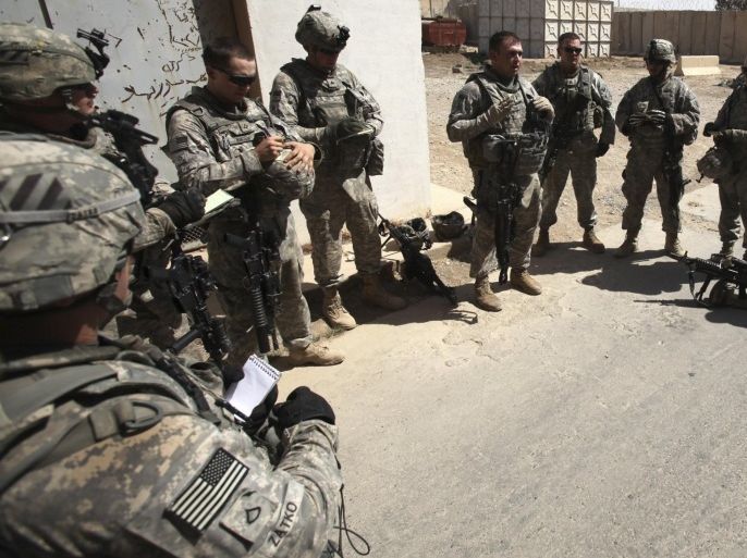 A U.S. squad leader gives safety instructions to his team before going out for a patrol in Mosul, 390 km (240 miles) north of Baghdad, September 5, 2010. Since U.S. President Barack Obama declared an end to combat operations in Iraq, U.S. troops have waged a gun battle with a suicide squad in Baghdad, dropped bombs on armed militants in Baquba and assisted Iraqi soldiers in a raid in Falluja. Obama's announcement on August 31 has not meant the end of fighting for some of the 50,000 U.S. military personnel remaining in Iraq 7-1/2 years after the invasion that removed Saddam Hussein. Picture taken September 5, 2010.