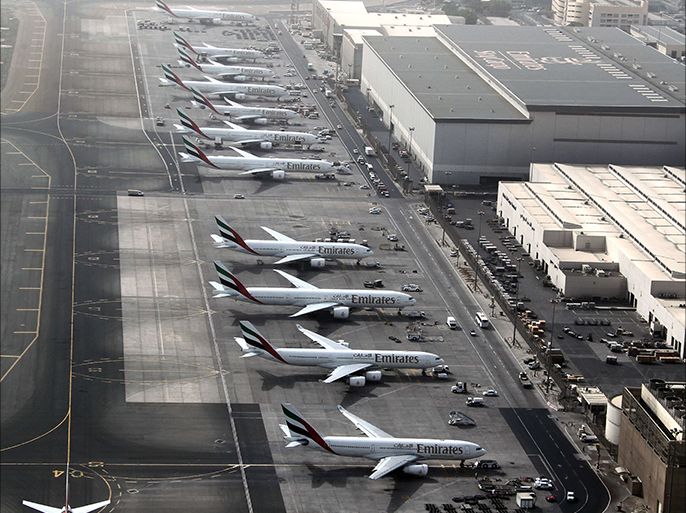 (FILES) - A file picture taken on May 27, 2012, an aerial view shows Dubai international airport, home to the national carrier Emirates Airways. Aviation will account for more than a third of Dubai's economy by 2020, a study said on November 17, 2014, of the Gulf emirate which has become a major international travel hub. AFP PHOTO/ KARIM SAHIB