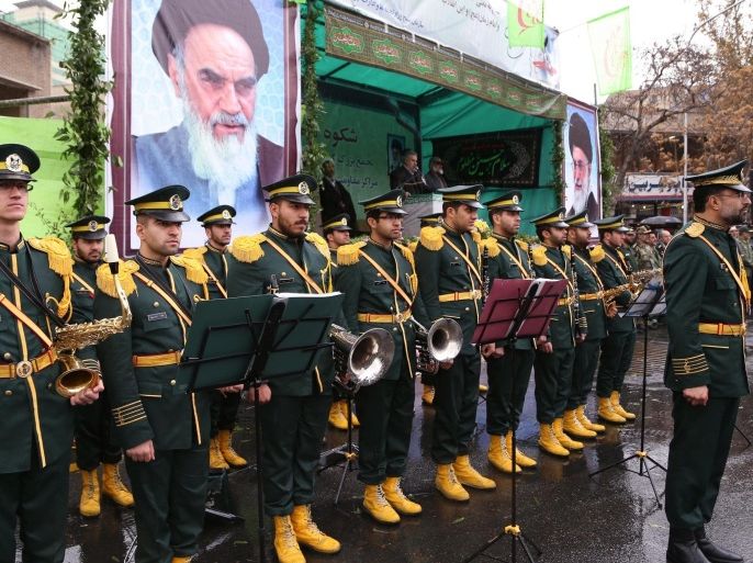 TEHRAN, IRAN - NOVEMBER 26: Iranian marching band perform during a rally marking the 35th anniversary of the Basij (The Organization for Mobilization of the Oppressed), a paramilitary volunteer militia established in 1979 by order of the Islamic Revolution's leader Ayatollah Khomeini, in Tehran, Iran on November 26, 2014. Basij is an auxiliary force with many duties, especially internal security, law enforcement, special religious or political events and morals policing. The Basij have branches in virtually every city and town in Iran.