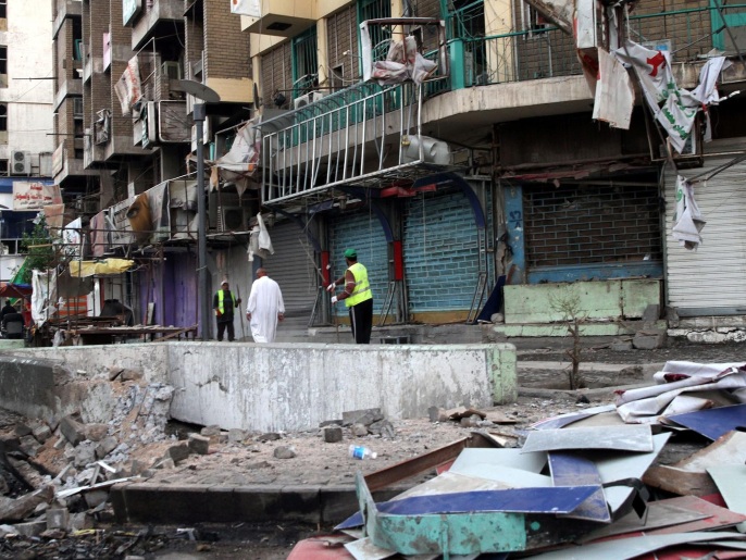 ‪آثار الدمار الذي خلفه تفجير سيارة اليوم في شارع السعدون وسط بغداد‬ (الأوروبية)