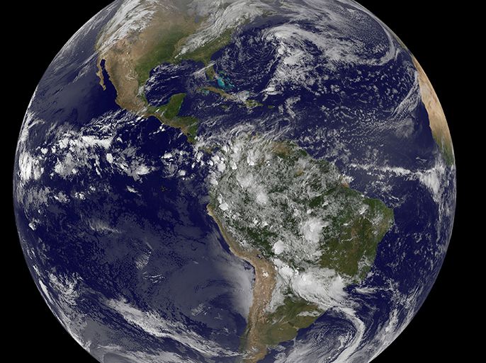 epa04176031 A handout satellite image provided by NASA / NOAA shows planet Earth with a view of the Americas, 22 April 2014. The image was produced by geostationary GOES satellites, which are always in the same position with respect to the rotating Earth. According to NASA, this allows GOES to hover continuously over one position on Earth's surface, appearing stationary. As a result, GOES provide a constant vigil for severe weather conditions such as tornadoes,