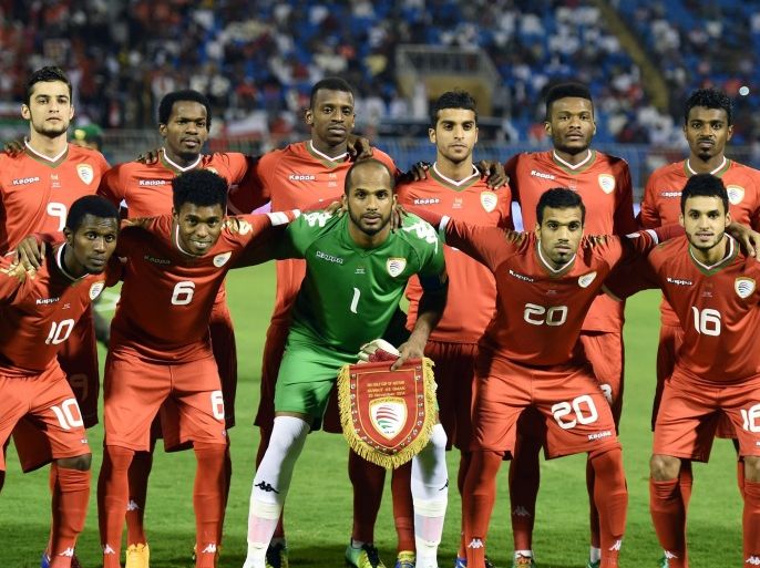 Oman's team pose for a team photo prior to their Group B Gulf Cup football match against Kuwait at the Prince Faisal bin Fahad stadium in Riyadh on November 20, 2014. Oman won the match 5-0. AFP PHOTO/ FAYEZ NURELDINE