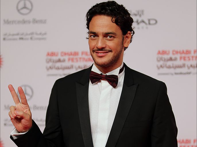 epa03922819 Egyptian actor Khaled Abol Naga arrives on the red carpet for the opening ceremony of the Abu Dhabi Film Festival (ADFF 2013), in Abu Dhabi, United Arab Emirates, 24 October 2013. The festival runs from 24 October to 02 November. EPA