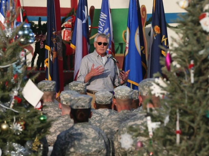 CAMP BUEHRING, KUWAIT - DECEMBER 08: U.S. Secretary of Defense Chuck Hagel speaks to U.S. troops during a visit, December 8, 2014 at Camp Buehring, Kuwait. Secretary Hagel visited the camp which once was a staging post for troops headed to Iraq.