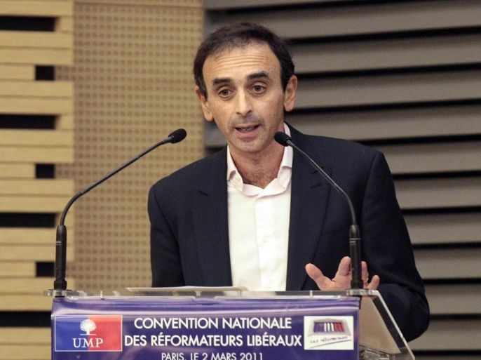 French journalist Eric Zemmour gives a speech during a party's meeting untitled 'Are social norms going to kill French people's freedom. We need some fresh air!', on March 2, 2011 at the French National Assembly in Paris. A French court condemned Zemmour, to a 1.000 euros deferred fine, for provocation to racial discrimination because he argued in a TV debate, that blacks ans Arabs were the targets of illegal racial profiling by the French police because the majority of traffickers are black and Arab'.