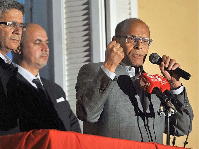 Tunisia's outgoing president Moncef Marzouki adresses his supporters at his campaign headquarters on December 23, 2014 in Tunis, a day after his rival Beji Caid Essebsi's victory in the presidential election. Essebsi, an 88-year-old veteran of previous governments, becomes the first president freely elected by Tunisians since independence from France in 1956