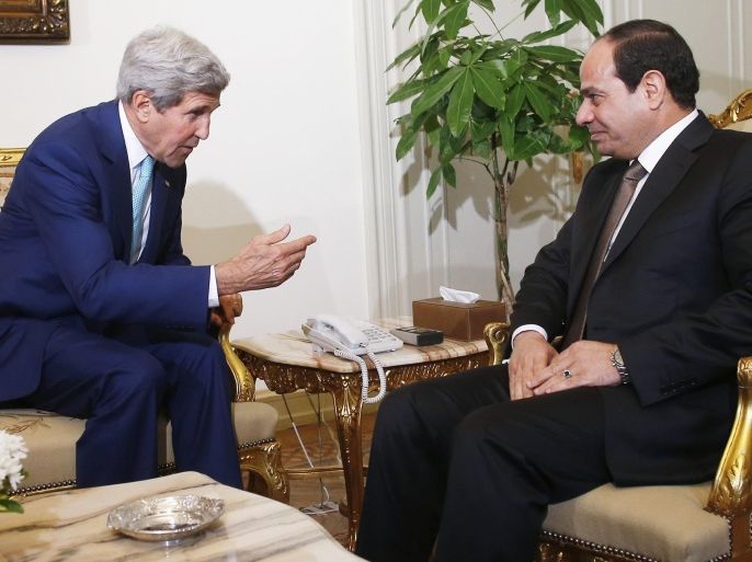 U.S. Secretary of State John Kerry (L) speaks with Egyptian President Abdel Fattah al-Sisi in Cairo July 22, 2014. Israel pounded targets across the Gaza Strip on Tuesday, saying no ceasefire was near as top U.S. and U.N. diplomats pursued talks on halting fighting that has claimed more than 500 lives. Dispatched by U.S. President Barack Obama to the Middle East to seek a ceasefire, Kerry held talks on Tuesday in Cairo with Egyptian Foreign Minister Sameh Shukri. REUTERS/Charles Dharapak/Pool (EGYPT - Tags: POLITICS CIVIL UNREST TPX IMAGES OF THE DAY)