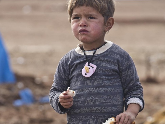 ‪طفل سوري بأحد المخيمات شمالي البلاد‬ (أسوشيتد برس-أرشيف)