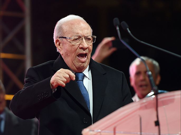 Tunisian presidential candidate for the anti-Islamist Nidaa Tounes party, Beji Caid Essebsi speaks during his last meeting on December 19, 2014 on the Avenue Bourguiba in Tunis, on the last day of campaigning before the second-round of the presidential election to be held on December 21. Nidaa Tounes won parliamentary elections in October and Essebsi has emerged as the clear favourite to be Tunisia's next president. AFP PHOTO / FETHI BELAID