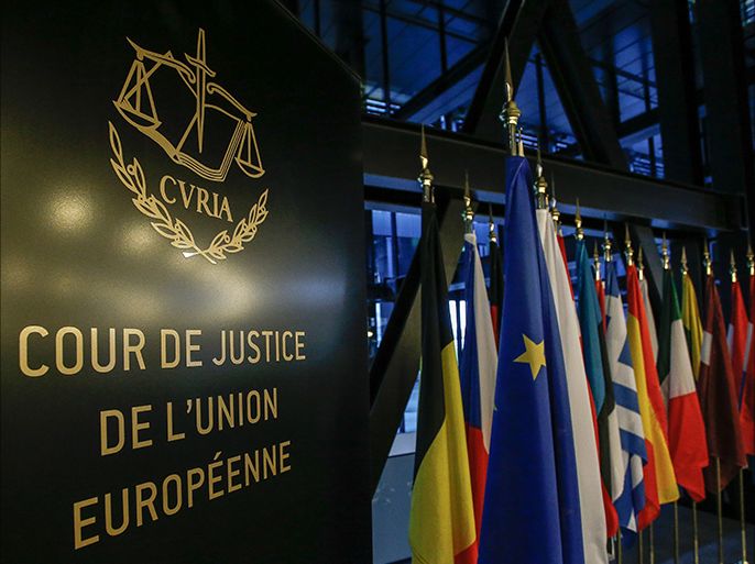 epa04523049 The logo of the EU Court of Justice and flags of member states in Luxembourg, Luxembourg, 10 December 2014. Members of the Commission are pledging to respect the Treaties and the Charter of Fundamental Rights of the EU, to carry out their responsibilities in complete independence and in the general interest of the Union. EPA/JULIEN WARNAND