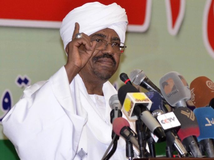 KHARTOUM, SUDAN - DECEMBER 13: President of Sudan Omar Hassan Ahmad al-Bashir speaks during a meeting of Sudanese farmers at Al Sadaka conference center in Khartoum, Sudan on December 13, 2014.