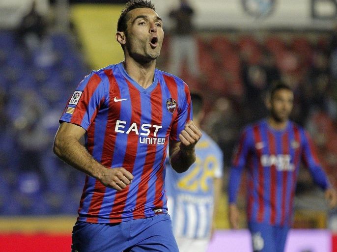 Levante´s striker David Barral celebrates after scoring his second goal against Malaga during their King's Cup round of sixteen second leg soccer match played at Ciutat de València stadium in Valencia, Spain, on 13 January 2015.