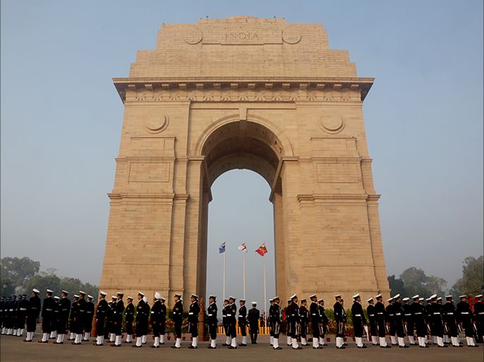epa04530832 Indian Defense personnel march after participating in the Vijay Diwas or Victory Day celebrations, at the Indian war memorial India Gate in New Delhi, India, 16 December 2014. The victory day is celebrated annually on December 16 to commemorate the victory over Pakistan in the 1971 war. EPA/MONEY SHARMA