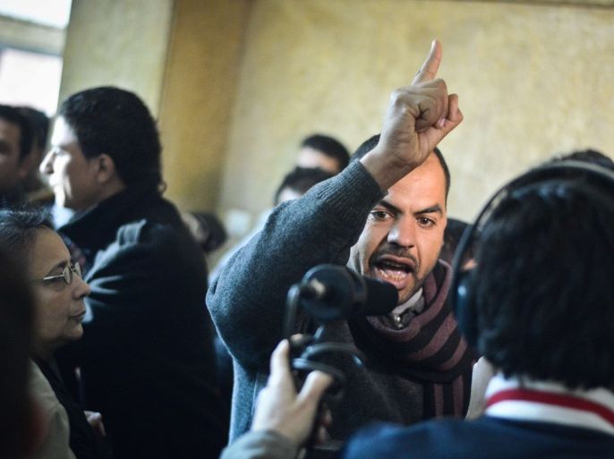 Family members react at an Egyptian court in Cairo following the acquittal on January 12, 2015 of 26 male defendants accused of "debauchery"