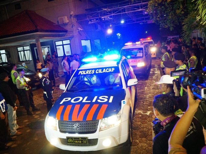 An Indonesian police car leads ambulances carrying five bodies of prisoners out of Wijayapura port as they arrived from Nusakambangan Island prison complex, after their execution under the death row for drug trafficking, in Cilacap, Central Java, Indonesia, 18 January 2015. Indonesia executed six people including a Dutch citizen on death row for drug trafficking on 18 January, after their requests for clemency were rejected by President Joko Widodo. According to media reports, Ang Kiem Soei, who was born in Indonesia and later became a Dutch citizen, was condemned to death in 2003 for drug trafficking. He is to be put to death along with five other people convicted of drug offenses - an Indonesian, Nigerian, Malawian, Brazilian and Vietnamese.
