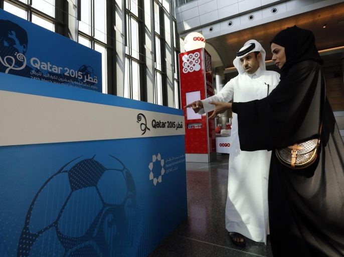 Dr. Thani Abdularhman Al Kuwari (C), Direcor General of the Qatar 2015 Organising Committee, is shown a Qatar 2015 welcome desk at the Hamad International Airport in Doha, Qatar, 07 January 2015, as he inspects the readiness of the facilities for the upcoming men's Handball World Championship 2015 taking place in Qatar from 15 January to 01 February. EPA/Valdrin Xhemaj Editorial Use Only/No Commercial Sales