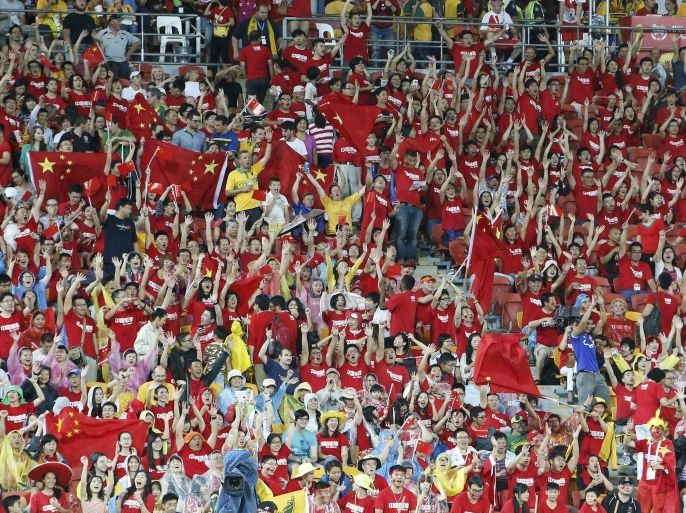 China fans cheer before the Asian Cup quarter-final soccer match between China and Australia at the Brisbane Stadium in Brisbane January 22, 2015. REUTERS/Edgar Su (AUSTRALIA - Tags: SPORT SOCCER)