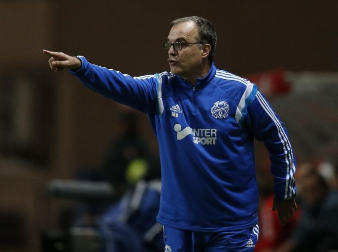 Marseille's Argentin head coach Marcelo Bielsa gestures during the French L1 football match Monaco (ASM) vs Marseille (OM) on December 14, 2014 at the 'Louis II Stadium' in Monaco. AFP PHOTO / VALERY HACHE