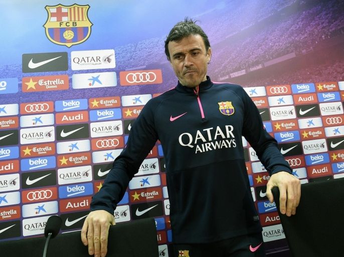 Barcelona's coach Luis Enrique Martinez takes a seat as he arrives for a press conference at the Sports Center FC Barcelona Joan Gamper in Sant Joan Despi, near Barcelona on January 7, 2015. Barcelona coach Luis Enrique insisted he had no regrets over his handling of the Catalans' star-studded squad this season amid reports his relationship with Lionel Messi is at breaking point. AFP PHOTO/ LLUIS GENE