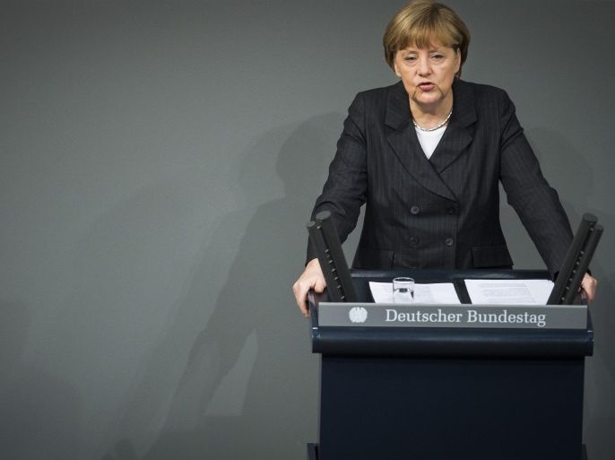 German Chancellor Angela Merkel addresses the members of parliament on the Paris attacks at the Bundestag lower house of parliament in Berlin on January 15, 2015.  AFP PHOTO / ODD ANDERSEN