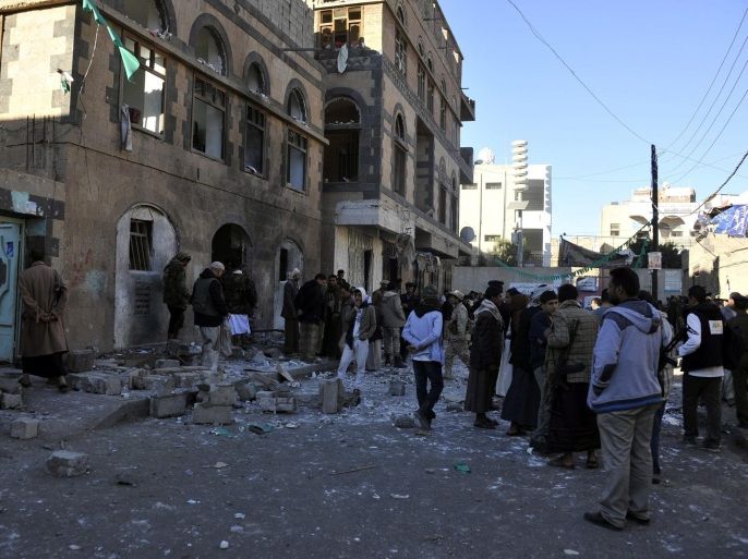 Yemenis inspect the scene of a bomb blast targeting a base of the Shiite Houthi militia in Sana'a, Yemen, 05 January 2015. Reports state a large explosion targeted a base of the Shiite Houthi militia in Sana'a, wounding at least six people, one day after al-Qaeda militants attacked a guesthouse of the Shiite Houthi militias in south of Sana'a, killing six militiamen and wounding 31 others.