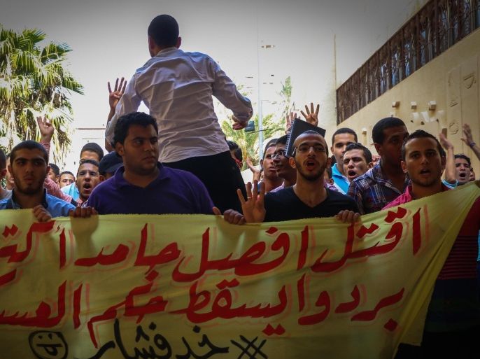 ALEXANDRIA, EGYPT - OCTOBER 11: Egytian students hold an anti-coup protest in Alexandria University in Egypt on October 11, 2014.