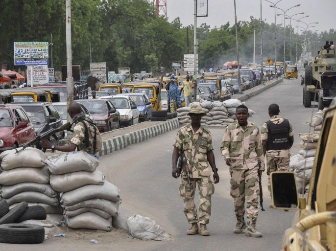 An undated photograph from 2014 made available 13 January 2015 shows members of the Nigerian military manning checkpoints in Maiduguri, North East Nigeria. The Nigerian government said up to 150 people had been killed by Boko Haram in the country's north last week and dismissed widespread reports that 2,000 people had died.