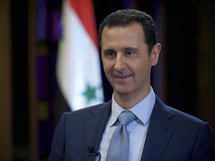 Syria's President Bashar al-Assad is seen during the filming of an interview with the BBC, in Damascus February 9, 2015. Assad said third parties including Iraq were conveying information to Damascus about a U.S.-led campaign of air strikes against the Islamic State militant group in Syria. In an interview with the BBC broadcast on Tuesday February 10, Assad said there was no direct cooperation with the United States, whose air force has been bombing Islamic State in Syria since September. Picture taken February 9, 2015. REUTERS/SANA/Handout via Reuters (SYRIA - Tags: CIVIL UNREST POLITICS CONFLICT MEDIA) ATTENTION EDITORS - THIS PICTURE WAS PROVIDED BY A THIRD PARTY. REUTERS IS UNABLE TO INDEPENDENTLY VERIFY THE AUTHENTICITY, CONTENT, LOCATION OR DATE OF THIS IMAGE. FOR EDITORIAL USE ONLY. NOT FOR SALE FOR MARKETING OR ADVERTISING CAMPAIGNS. THIS PICTURE IS DISTRIBUTED EXACTLY AS RECEIVED BY REUTERS, AS A SERVICE TO CLIENTS