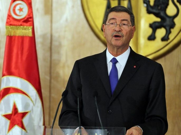 Tunisia's new Prime Minister, Habib Essid, speaks during a ceremony marking the transfer of power from former Prime Minister, Mehdi Jomaa (not pictured), Tunis, Tunisia, 06 February 2015. Tunisia's parliament approved 06 January Essid's unity government led by Nidaa Tounes and incorporating rivals Ennahda with 166 members of the 217 seat parliament in favor.