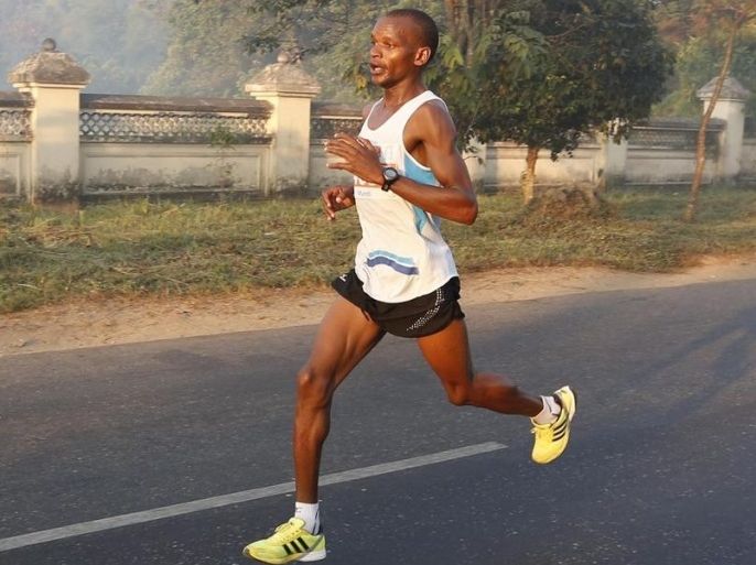 Onesmus Muindi of Kenya takes part in Myanmar's first ever international marathon in Yangon, Myanmar, 27 January 2013. Over one thousand runners, including around 500 foreign runners from over 20 countries, participated Myanmar's first ever international marathon on 27 January 2013 in Yangon.