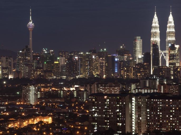 The city skyline of Kuala Lumpur in Ampang is seen on November 17, 2014. Growth in Malaysia's economy slowed to a 'moderate' 5.6 percent in the third quarter as exports decelerated, the central bank said on November 14, but it added that domestic demand was expected to support steady expansion. AFP PHOTO / MOHD RASFAN