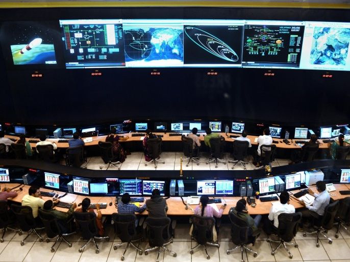 Indian scientists and engineers of Indian Space Research Organization (ISRO) monitor the Mars Orbiter Mission (MOM) at the tracking centre, ISTRAC (ISRO Telemetry, Tracking and Command Network) which controls the Mars Orbiter Mission (MOM) in Bangalore on November 27, 2013. ISTRAC will now be the nerve centre of India's prestigious Mars mission, also called 'Mangalyaan', in communicating and controlling the spacecraft. AFP PHOTO/Manjunath KIRAN