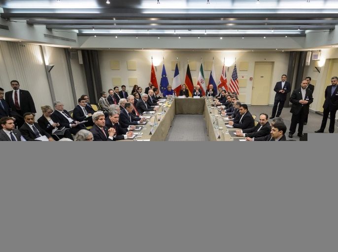 P5+1 ministers, European Union and Iranian officials wait for the opening of a plenary session on Iran nuclear talks at the Beau Rivage Palace Hotel in Lausanne, Switzerland, on March 30, 2015. The top diplomats of Iran and the United States, China, Russia, Britain, France and Germany aim by the end of March 31 to agree the outlines of a deal curtailing Iran's nuclear programme. AFP PHOTO / FABRICE COFFRINI