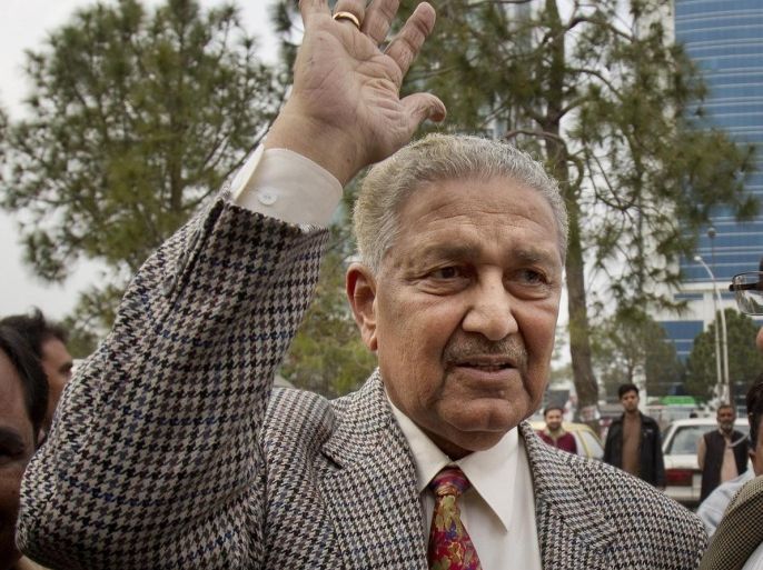 Pakistan's nuclear scientist Abdul Qadeer Khan, who once confessed to passing nuclear secrets to Iran, North Korea, and Libya, waves to supporters in Islamabad, Pakistan, Tuesday, Feb. 26, 2013. Khan, scientist-turned-politician joined hands with Pakistan's anti-American religious party Jamaat-e-Islami for the upcoming elections which the government has suggested may be held in May 2013. (AP Photo/B.K. Bangash)