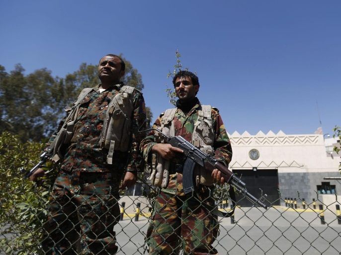 Yemeni soldiers stand guard outside the US embassy before authorities remove concrete barriers blocking the access to the closed embassy in Sana'a, Yemen, 04 March 2015. Reports state Yemens security authorities removed concrete barriers in front of the US Embassy, which was shut down last month. This step came a day after the US announced that its diplomatic mission to Yemen will work out of the Saudi port city of Jeddah. The United States shut its embassy in Yemen, citing the uncertain security situation, as the country goes through a crisis following a takeover by Houthi rebels.