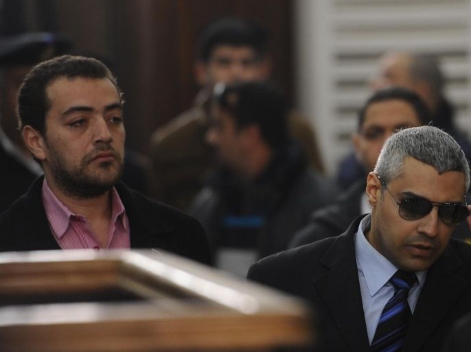 CAIRO, EGYPT - FEBRUARY 23: Al Jazeera journalists Baher Mohamed (L) and Mohamed Fahmy (R) are seen during a trial in Cairo, Egypt, on February 23, 2015. An Egyptian court on Monday adjourned to March 8 the trial of two journalists accused of 'inciting violence' a judicial source has said. According to the source, the court adjourned trial proceedings to March 8 in order to hear from prosecution witnesses and review 'evidence' introduced against the defendants. Earlier this month, Al Jazeera journalists Mohamed Fahmy and Baher Mohamed were both released from prison after an Egyptian court ordered their release pending trial.