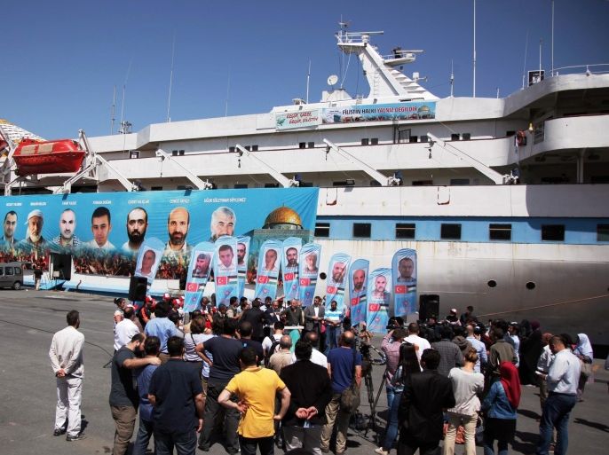 Pro-Palestinian Turks gather on the fourth anniversary of the Mavi Marmara ship, the lead boat of a flotilla headed to the Gaza Strip which was stormed by Israeli naval commandos in a predawn confrontation in the Mediterranean May 31, 2010, in Istanbul, Turkey, Friday, May 30, 2014. Israeli naval commandos stormed a flotilla of ships carrying aid and hundreds of pro-Palestinian activists to the blockaded Gaza Strip on May 31, killing nine Turkish passengers in a botched raid that provoked international outrage and a diplomatic crisis between the two countries.(AP Photo)