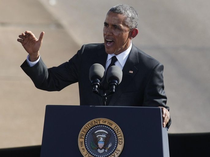U.S. President Barack Obama speaks at the foot of the Edmund Pettus Bridge in Selma, AL. March 7, 2015. Obama delivered remarks at the Edmund Pettus Bridge to commemorate the 50th anniversary of the Selma to Montgomery civil rights marches. REUTERS/Tami Chappell (UNITED STATES - Tags: POLITICS ANNIVERSARY SOCIETY)