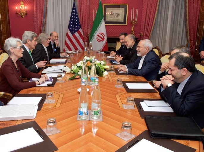 LAUSANNE, SWITZERLAND - MARCH 17: U.S. Secretary of State John Kerry (L 3) and his Iranian counterpart Mohammad Javad Zarif (R 3) are seen during nuclear talks in Lausanne, Switzerland on March 17, 2015. U.S Secretary of Energy Ernest Moniz (L 4) and head of Atomic Energy Organization of Iran Ali Akbar Salehi (R 4) also attended the meeting.