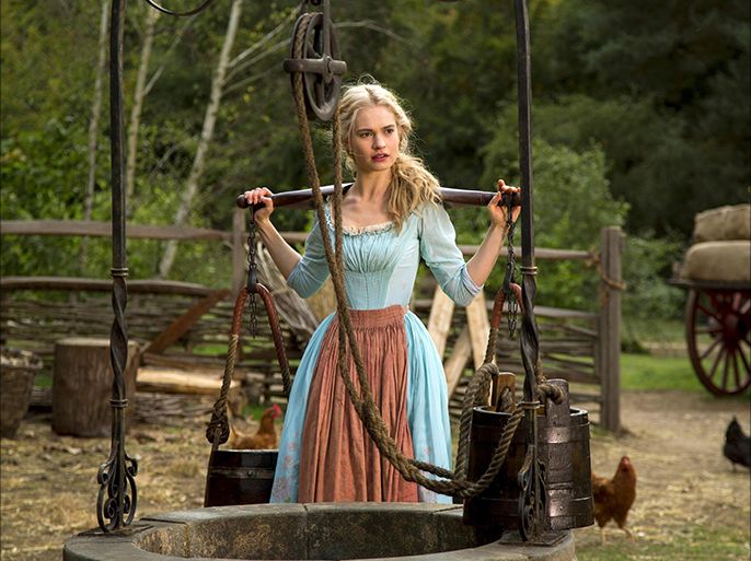 This image released by Disney shows Lily James as Cinderella in Disney's live-action feature film inspired by the classic fairy tale, "Cinderella." (AP Photo/Disney, Jonathan Olley)