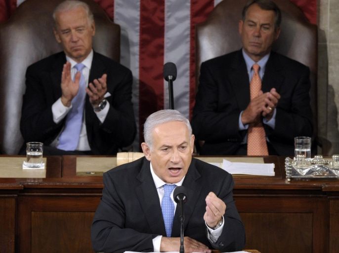 FILE - In this May 24, 2011 file photo, Israeli Prime Minister Benjamin Netanyahu addresses a joint meeting of Congress on Capitol Hill in Washington. Given anywhere else, Israeli Prime Minister Benjamin Netanyahu’s speech Tuesday wouldn’t cause such a fuss. But a foreign leader denouncing U.S. policy from within the grand hall of American democracy upends nearly two centuries of tradition. A joint meeting of Congress, gathering senators and representatives together in the House chamber, is a ceremony typically bestowed on one or two friendly foreign leaders per year. It looks a lot like a presidential State of the Union address. The speaker embodies his or her nation; the audience of lawmakers represents all Americans. Vice President Joe Biden, left, and House Speaker John Boehner of Ohio, right, listen. (AP Photo/Susan Walsh)