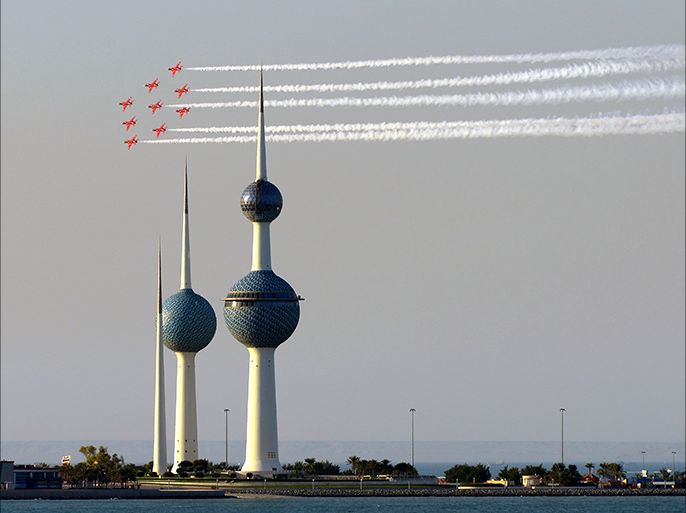 epa03966270 Aircrafts from the British Royal Air Force Aerobatic Team (Red Arrows) perform over the Kuwait Towers, the country's three landmarks, in Kuwait City, Kuwait, 26 November 2013. The Red Arrows is touring the Middle East with planned airshows in Saudi Arabia, Qatar, Jordan, Oman, and the United Arab Emirates. EPA/RAED QUTENA