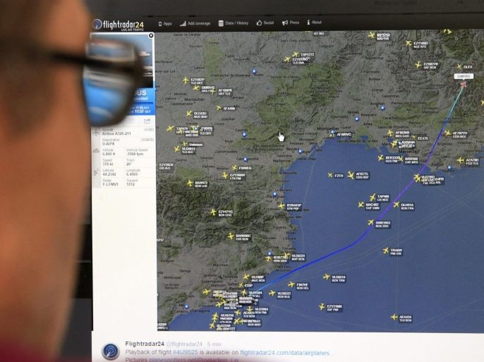 A man looks at a monitor showing a map released on the webpage 'flightradar24 with the exact point where the radar signal of the crashed Airbus A320 aircraft operated by German budget airline 'Germanwings' went missing near Barcelonnette, in the department of Alpes-de-Haute-Provence, in Madrid, Spain, 24 March 2014. Germanwings Flight 4U 9525 from Barcelona to Duesseldorf crashed over Southern Alps in France with more than 140 passengers and six crew on board, German air traffic control said 24 March 2015. French President François Hollande said there were 42 Spaniards on board. Reports suggest that none of the passengers on board have survived.