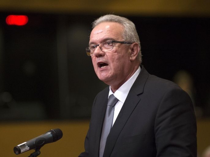 EU Commissioner of International Cooperation and Development Neven Mimica, takes the oath of office, on December 10, 2014 at the Court of Justice of the European Union in Luxembourg. AFP PHOTO / JOHN THYS.