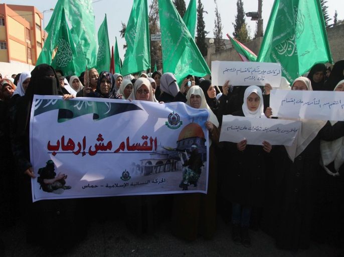 GAZA CITY, GAZA - FEBRUARY 09: A group of Palestinian women stage a protest against the Egypt's Emergency State Security Court's blacklisting Hamas' armed wing Izz ad-Din al-Qassam Brigades as a terrorist organization outside the Egyptian Representation Office in Gaza City, Gaza on February 09, 2015.