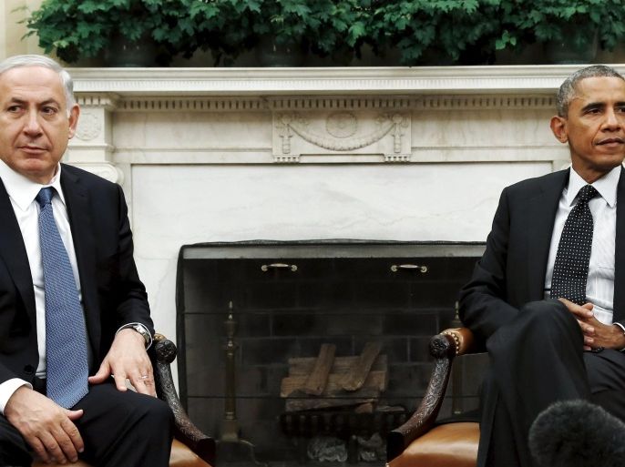 U.S. President Barack Obama (R) meets with Israel's Prime Minister Benjamin Netanyahu at the White House in Washington in this file photo taken October 1, 2014. Netanyahu's allies acknowledged on March 22, 2015, that his election-eve disavowal of a Palestinian state had caused a rift with the White House, but blamed Obama's unprecedented criticism on a misunderstanding. REUTERS/Kevin Lamarque/Files
