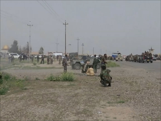 القوات العراقية وقوات الحشد الشعبي لم تستطع حتى الساعة استعادة تكريت (الجزيرة)