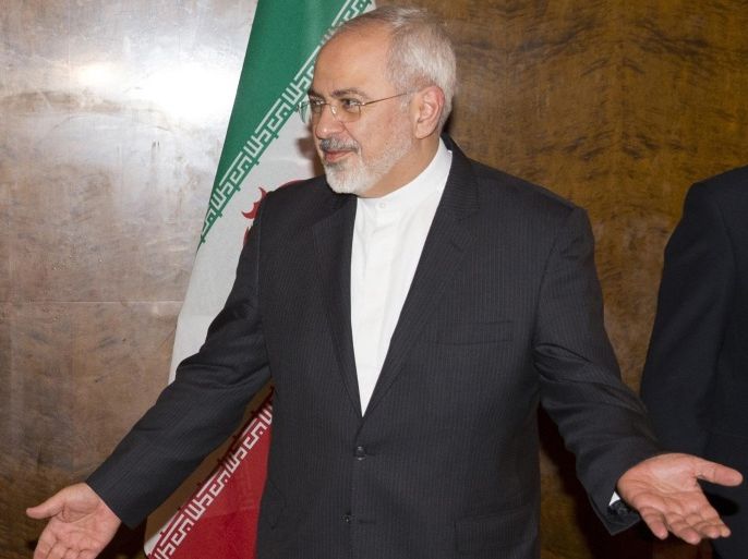 Iranian Foreign Minister Mohammad Javad Zarif arrives for a meeting during a new round of nuclear negotiations in Montreux, in this March 2, 2015 file photo. Zarif criticized U.S. Republican senators on March 9, 2015 after they warned Iran's leaders in an open letter that any nuclear deal with U.S.President Barack Obama could last only as long as he remains in office, an unusual partisan intervention in foreign policy that could undermine delicate international talks with Tehran. Zarif dismissed the letter as a "propaganda ploy" from pressure groups he called afraid of diplomatic agreement. REUTERS/Evan Vucci/Pool-Files (SWITZERLAND - Tags: POLITICS)