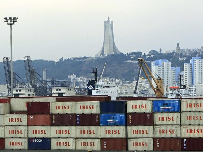 Containers are seen at a dock in Algiers August 10, 2010. Since import restrictions were introduced last year as part of a trend towards economic nationalism that has also seen foreign investors targeted, they have been the focus of mounting anger in Algeria's business community. Picture taken August 10, 2010.