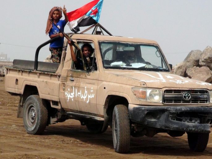 Tribal militiamen loyal to Yemeni President Abdo Rabbo Mansour Hadi riding a truck flash the victory sign during clashes with Houthi fighter in the southern port city of Aden, Yemen, 09 April 2015. According to reports, tribal militiamen loyal to Yemeni President Hadi in Aden city made gains against Houthi fighters in the ongoing fight for control of the city.